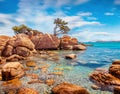 Amazing morning scene of popular touris deastination - Capriccioli beach. Scenic public beach with sand & granite rocks nestled in Royalty Free Stock Photo