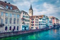 Amazing morning view of Fraumunster Church. Bright autumn cityscape of Zurich, Switzerland, Europe. Stunning landscape of Limmat R Royalty Free Stock Photo