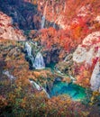 Amazing morning view of pure water waterfall in dyyp canyon. Exotic autumn scene of Plitvice National Park, Croatia, Europe. Beaut Royalty Free Stock Photo