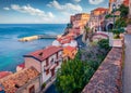 Amazing morning view of Scilla town with Ruffo castle on background