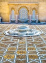 Amazing moroccan style fountain with fine colorful mosaic tiles at the Mohammed V mausoleum in Rabat Morocco. Artistic picture. Royalty Free Stock Photo