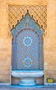 Amazing moroccan style fountain with fine colorful mosaic tiles at the Mohammed V mausoleum in Rabat Morocco. Artistic picture. Royalty Free Stock Photo