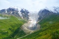 Amazing mountain Caucasus landscape of peaks of mountains Tetnuldi, Gistola and Dzhangi-Tau and glacier Lardaad in Svaneti, Georgi Royalty Free Stock Photo