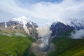 Amazing mountain Caucasus landscape of peaks of mountains Tetnuldi, Gistola and Dzhangi-Tau and glacier Lardaad in Svaneti, Georgi Royalty Free Stock Photo