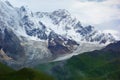 Amazing mountain Caucasus landscape of peaks of mountains Tetnuldi, Gistola and Dzhangi-Tau and glacier Lardaad in Svaneti, Georgi Royalty Free Stock Photo