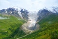 Amazing mountain Caucasus landscape of peaks of mountains Tetnuldi, Gistola and Dzhangi-Tau and glacier Lardaad in Svaneti, Royalty Free Stock Photo