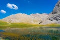 Amazing mountain lake landscape between Bolkar Mountain and Taurus Mountain. Panoramic view of black lake at sunset. Nigde, Turkey