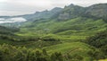 Amazing mountain landscape with clouds, tea estate natural outdoor travel background. Beauty world Royalty Free Stock Photo