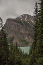 Amazing mountain landscape - Lake Louise, Rocky Mountains. Banff Tourism, National Park, Alberta, Canada. Royalty Free Stock Photo