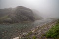 Amazing mountain river in Norway foggy morning Turquoise River. Fast flow mountain River in Norway Royalty Free Stock Photo