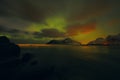 Amazing multicolored Aurora Borealis also know as Northern Lights in the night sky over Lofoten landscape, Norway, Scandinavia. Royalty Free Stock Photo