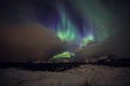 Amazing multicolored Aurora Borealis also know as Northern Lights in the night sky over Lofoten landscape, Norway, Scandinavia. Royalty Free Stock Photo