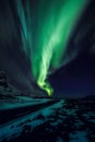 Amazing multicolored green Aurora Borealis also know as Northern Lights in the night sky over Lofoten landscape, Norway, Scandinav Royalty Free Stock Photo