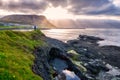 Amazing nature landscape, summer time in Iceland. Fantastic view of the rocky Atlantic coast, ocean and dramatic cloudy sky Royalty Free Stock Photo