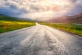 Amazing nature, sunny landscape with scenic empty asphalt road and cloudy sky Royalty Free Stock Photo