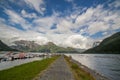 Amazing nature view with pier, fjord and mountain. Pier for boats in front of the view. Scandinavian Mountains, Norway. Artistic