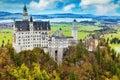 Amazing Neuschwanstein castle autumn view from the viewpoint on the bridge