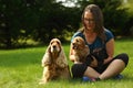 Amazing, newborn and cute red English Cocker Spaniel puppies with her mother in human hug Royalty Free Stock Photo