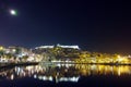 Amazing night photo of Kavala and moon over old town, Greece