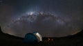 An amazing night sky at Atacama Desert. A tent, a campfire and the milky way over us, just an awe nightscape over our base camp