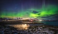 Amazing night sky with Aurora Borealis over Atlantic Ocean Road in Norway Royalty Free Stock Photo