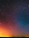 Amazing Night Sky Glowing Stars Background Backdrop In Rotation. Colorful Sky Gradient. Sunset Sunrise Light And Royalty Free Stock Photo