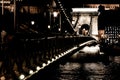 Amazing night view of the illuminated Chain Bridge close-up. Beautiful vintage lantern. Budapest Royalty Free Stock Photo