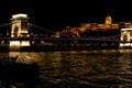 Amazing night view of the illuminated Chain Bridge close-up. Beautiful vintage lantern. Budapest Royalty Free Stock Photo