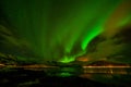 Amazing northern lights, Aurora borealis over the mountains in the North of Europe - Lofoten islands, Norway Royalty Free Stock Photo