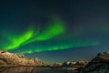 Amazing northern lights, Aurora borealis over the mountains in the North of Europe - Lofoten islands, Norway Royalty Free Stock Photo