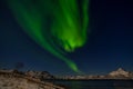 Amazing northern lights, Aurora borealis over the mountains in the North of Europe - Lofoten islands, Norway Royalty Free Stock Photo