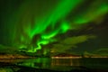 Amazing northern lights, Aurora borealis over the mountains in the North of Europe - Lofoten islands, Norway Royalty Free Stock Photo