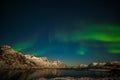 Amazing northern lights, Aurora borealis over the mountains in the North of Europe - Lofoten islands, Norway Royalty Free Stock Photo