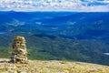 Amazing Norway norwegian landscape Stacked stones summit top of mountain