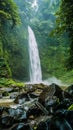 Amazing Nungnung waterfall, Huge Rocks in front, Bali, Indonesia