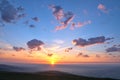 Amazing orange, pink and purple colors of a summer sunset over the city of Dublin view from Fairy Castle, Dublin Mountains