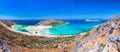 Amazing panorama of Balos Lagoon with magical turquoise waters, lagoons, tropical beaches of pure white sand and Gramvousa island Royalty Free Stock Photo