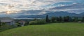 Amazing panorama with mountains and lake at sunset. Varese lake Italy Royalty Free Stock Photo