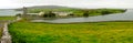 Amazing Panorama Of Ocean Bay With Gothic Lighthouse Tower, Green Gras And Scenery Road Near Galway, County Clare, Ireland
