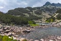 Amazing Panorama of Rocky peaks and Upper Muratovo lake, Pirin Mountain Royalty Free Stock Photo