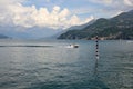 Amazing panorama with white clouds of Bellagio town on Lake Como, Italy