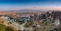 Amazing panoramic aerial view of hot air balloons at sunrise in Goreme National Park.Uchisar Castle. Cappadocia.Turkey. Royalty Free Stock Photo