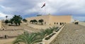 Amazing panoramic inside view at the Luanda Fortress, interior buildings garden and military and colonial museum, Angolan flag, in