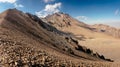 Amazing panoramic landscape of Mount Erciyes. View of the an inactive volcano: mountain range, stony slopes, rocky peaks formed by Royalty Free Stock Photo