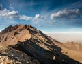 Amazing panoramic landscape of Mount Erciyes. View of the an inactive volcano: mountain range, stony slopes, rocky peaks formed by Royalty Free Stock Photo