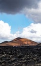 Amazing panoramic landscape of volcano craters in Timanfaya national park. Popular touristic attraction in Lanzarote