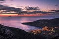 Amazing panoramic shot of the Komiza town facing the Adriatic Sea from Island Vis in Croatia