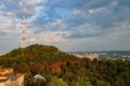 Panoramic view of High Castle hill with yellowed autumn trees and TV tower against picturesque sky, Lviv, Ukraine Royalty Free Stock Photo