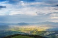 Amazing  panoramic view with high mountain village on horizon and blue  sky. summer autumn landscape. beautiful natural Royalty Free Stock Photo