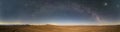 An amazing panoramic view of the Milky Way above Atacama Desert vast sand fields. An awe night sky view with our galaxy arm Royalty Free Stock Photo